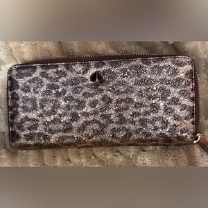 KATE SPADE METALLIC ROSE GOLD ZIP WALLET